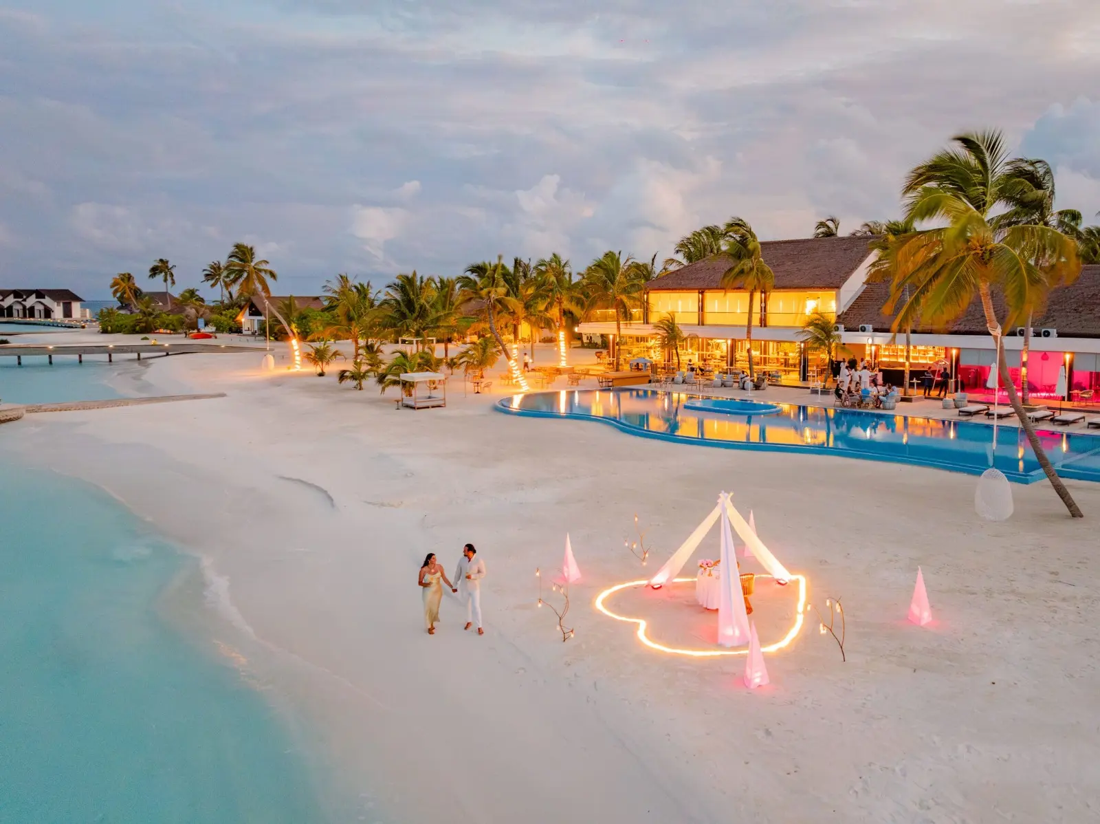 NOOE Maldives Kunaavashi is a contemporary luxury resort located in the beautiful Vaavu Atoll, one of the Maldives’ most untouched and picturesque destinations. Surrounded by crystal-clear lagoons, pristine beaches, and vibrant marine life, the resort offers a refreshing blend of modern elegance, personalized service, and authentic island experiences.
Designed for couples, honeymooners, families, and travelers seeking both relaxation and adventure, NOOE Maldives features stylish beachfront and overwater villas, exceptional dining venues, wellness experiences, and a variety of water activities. Its tranquil setting and breathtaking natural surroundings create the perfect environment for guests to unwind while exploring the beauty of the Maldives.
Whether you're seeking a romantic escape, a family holiday, or a luxurious tropical retreat, NOOE Maldives Kunaavashi delivers an unforgettable experience where comfort, nature, and island charm come together seamlessly.