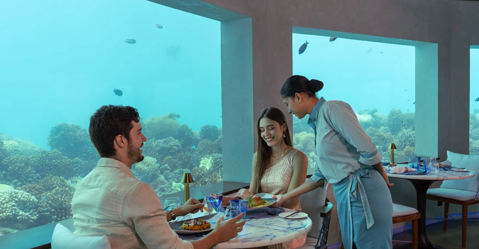 OBLU SELECT Lobigili is an exclusive adults-only resort located in North Malé Atoll, offering a romantic island escape designed especially for couples and honeymooners. Surrounded by crystal-clear lagoons, white sandy beaches, and breathtaking ocean views, the resort combines contemporary luxury with a relaxed tropical atmosphere, creating the perfect setting for unforgettable moments together.
The name "Lobigili" translates to "Island of Love" in the Maldivian language, reflecting the resort’s focus on romance, intimacy, and personalized experiences. Guests can enjoy elegant beachfront and overwater villas, exceptional dining venues, premium all-inclusive benefits, and a variety of activities tailored to couples seeking both relaxation and adventure.
Whether you're celebrating a honeymoon, anniversary, or simply a romantic getaway, OBLU SELECT Lobigili delivers a luxurious and memorable Maldives experience where every detail is designed for two.