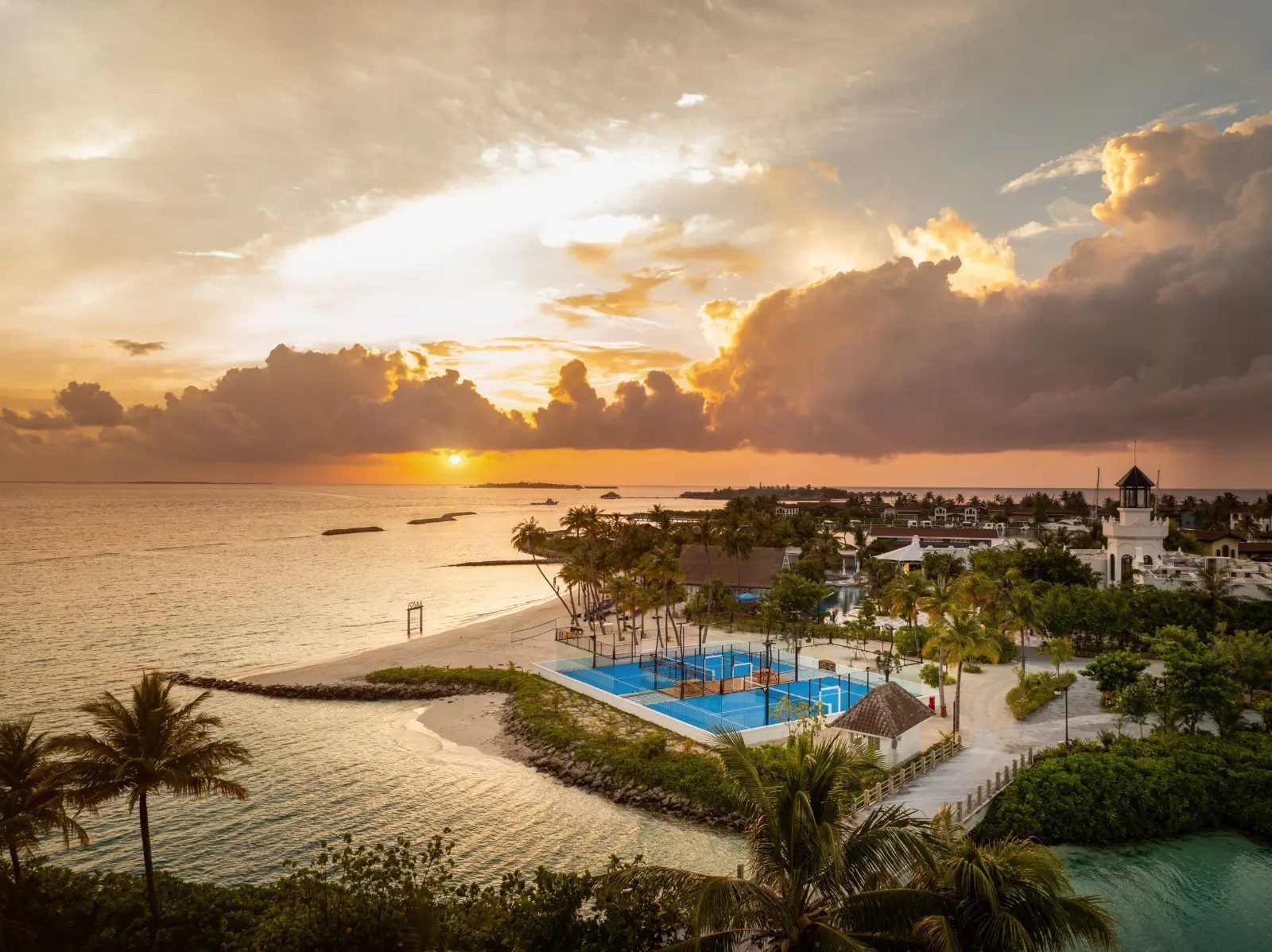 SAii Lagoon Maldives is a vibrant lifestyle resort located in the stunning Emboodhoo Lagoon, offering a unique blend of tropical island charm, contemporary comfort, and exciting experiences. Connected to CROSSROADS Maldives, the country's first integrated leisure destination, the resort provides guests with access to a world of dining, entertainment, shopping, and leisure activities unlike anywhere else in the Maldives.
Designed with a relaxed and playful atmosphere, SAii Lagoon Maldives is ideal for couples, families, and groups of friends looking for both adventure and relaxation. The resort features stylish accommodations, crystal-clear lagoons, white sandy beaches, and a variety of water sports and recreational activities, all complemented by warm hospitality and modern island living.
Whether you're planning a romantic getaway, a family holiday, or a fun-filled tropical escape, SAii Lagoon Maldives offers the perfect combination of relaxation, entertainment, and unforgettable experiences in the heart of the Maldives.