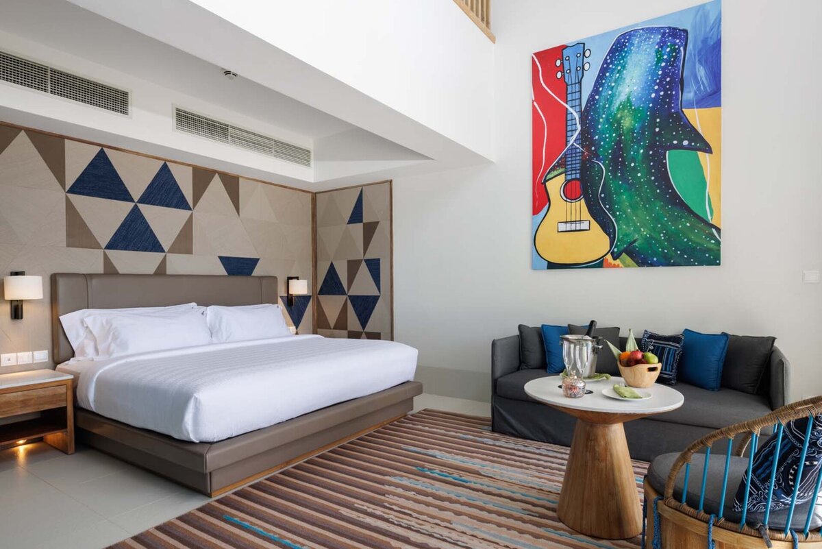 - Our Silver Family Suite Duplex offers the perfect amount of space for your band of four, five, or six - A master bedroom with a king bed and a sofa bed on the ground floor - Openly connected to the upper floor by a staircase where a bunk bed is located - At this Maldives family resort, parents enjoy peace of mind while the junior Rock Stars also have their own space