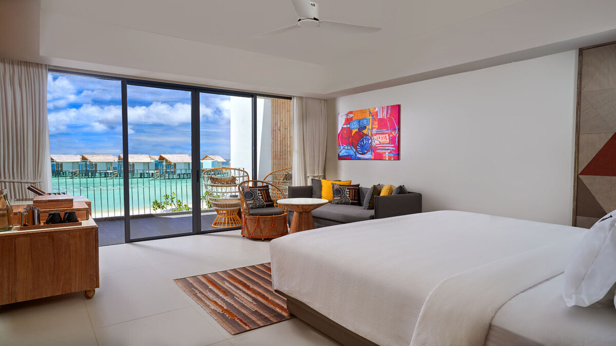 - Simple, sophisticated, and snazzy - The Silver Sky Studio features a king bed - Private balcony - Waterfall showers - Enjoy unobstructed ocean views high above the ground at this Maldives 5-star hotel