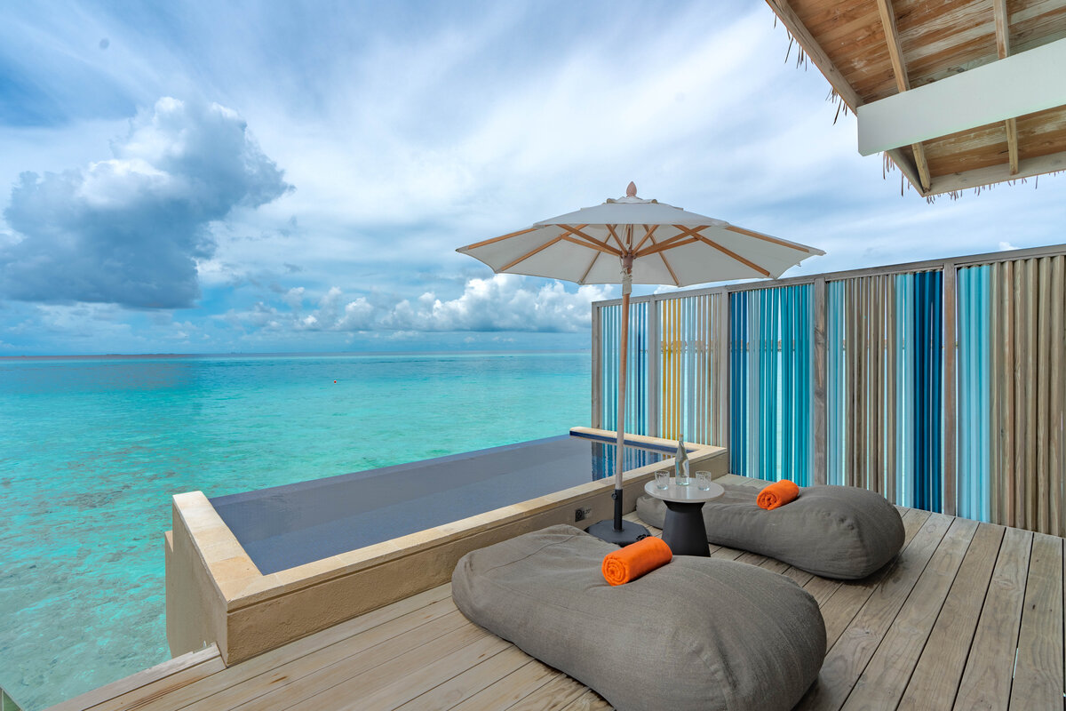 - With direct access to the crystal clear lagoon and a spectacular infinite view - The Diamond Overwater Pool Villa is located on the south wing of the island - Includes 1 king bed or 2 double beds - Private terrace with a plunge pool - Sun loungers