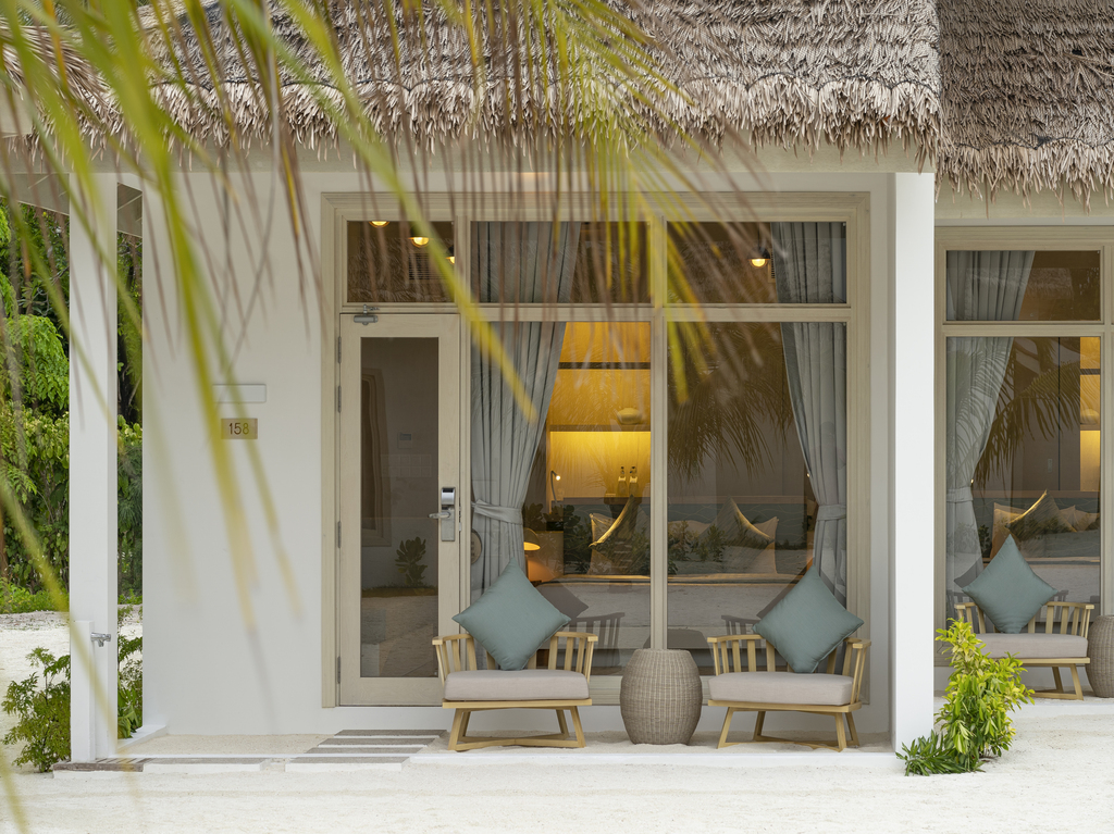 - The perfect fusion of traditional Maldivian architecture with whitewashed interiors and thatched roofs, these villas offer all modern conveniences and stylish minimalist decor. Beach Villas provide direct access to the white sandy beach and feature both a bathtub and an outdoor shower