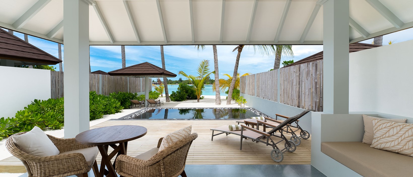 - 101 square metres of sleek, sophisticated beachside living The Grand Beach ticks all the boxes: lots of space A living room. A verandah facing the sea A whit washed tropical bathroom The most gorgeous beachfront swimming pool Daybeds to lounge on. It’s all there