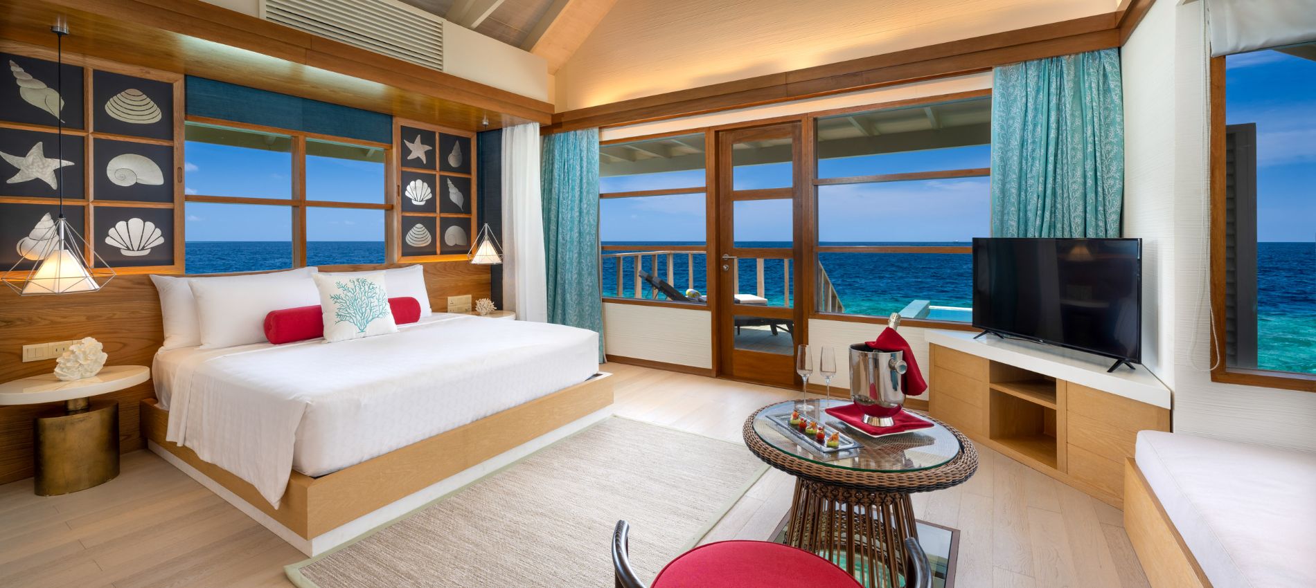 - Enveloped in the warm embrace of the Indian Ocean, this stylish one bedroom overwater villa with pool is perfect for a romantic couples’ retreat - Occupancy 2 ADULT - King bed - Villa Size 75 M - Private 8 M² Pool