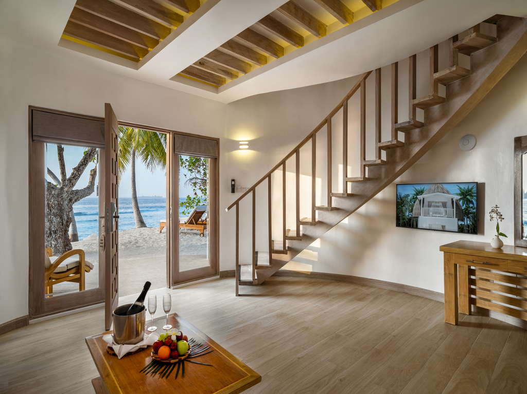 - Our Premium Beach Villas set a mere stroll away from your exclusive strip of the beach, is the perfect tropical getaway for couples and small families Designed with comfort and luxury in mind, the two floor Villa features ample living space on the ground floor, a large sundeck, and a modern bathroom with an outdoor jetted tub. The upstairs bedroom, with its balcony and floor to ceiling windows, offer unparalleled beach vistas that you will cherish for a lifetime