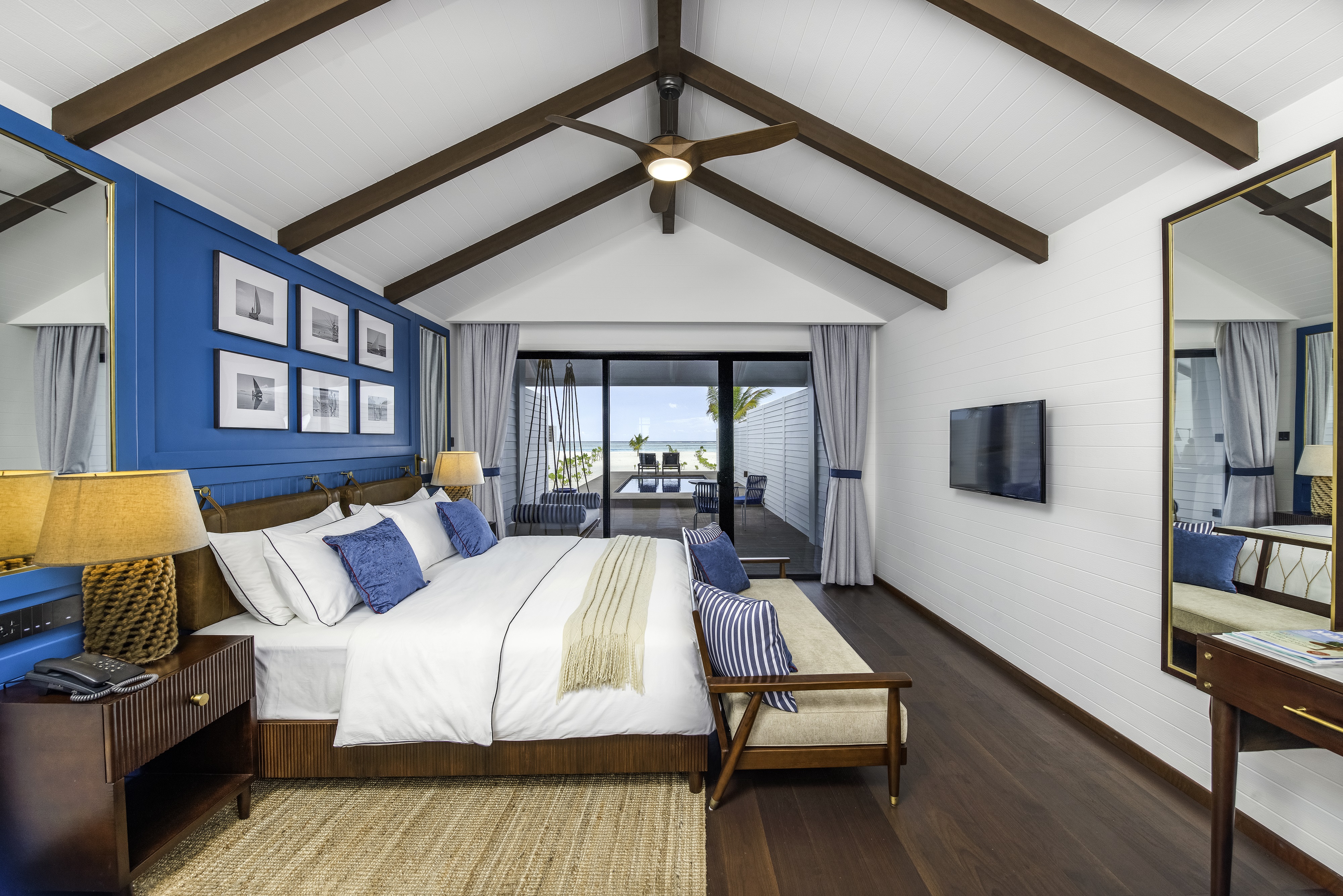 - These rooms offer modern design and amenities with a view of the enchanting lagoons, a distinct Maldivian experience - Size: 150 - View: beach - Beds: Double Bed + Sofa Bed - Max Occupancy: 3