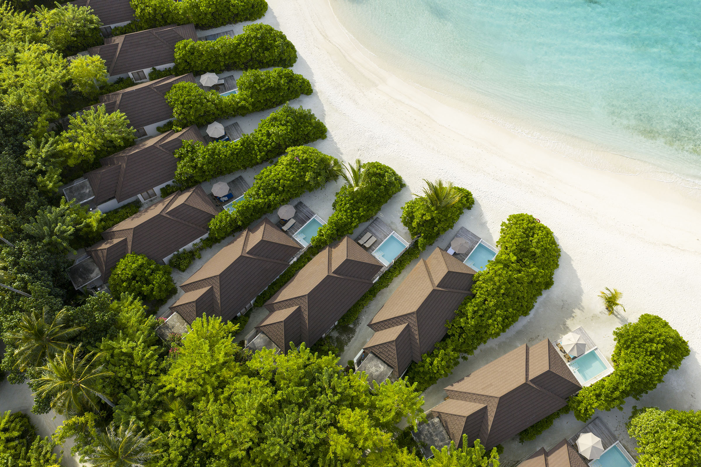 - It’s the dream Maldives beach villa. For starters the location is prime real estate, right on sandy shores, steps from the turquoise lagoon The infinity pool is located beach side as well, adding yet another shade of blue to the horizon. Plus, how convenient to be able to skip from pool to lagoon on repeat The tropical white washed bathroom is a delight