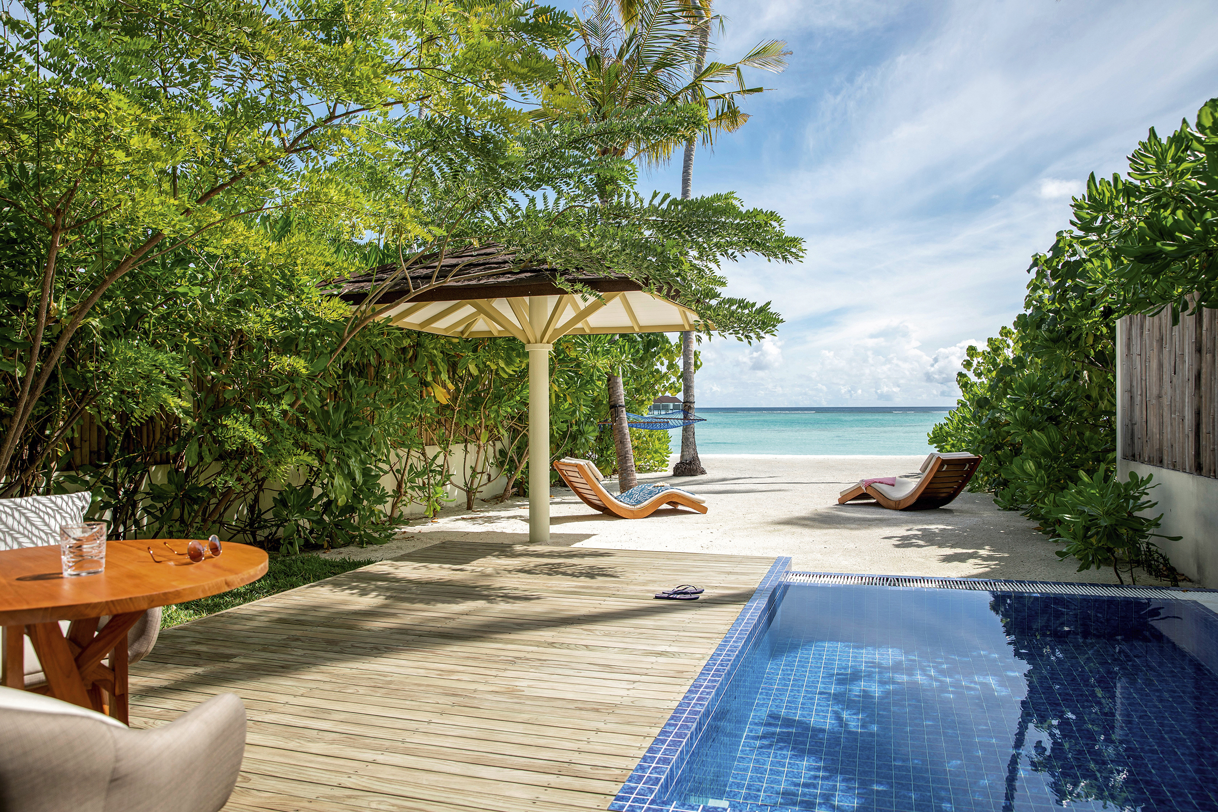 - This villa was designed with couples in mind There’s something about the private pool, the incredible location, and the breathtaking views that is oh so romantic The design is contemporary with beach bungalow vibes The pool is beach side meaning you can spend your days alternating between pool and sea, sea and pool