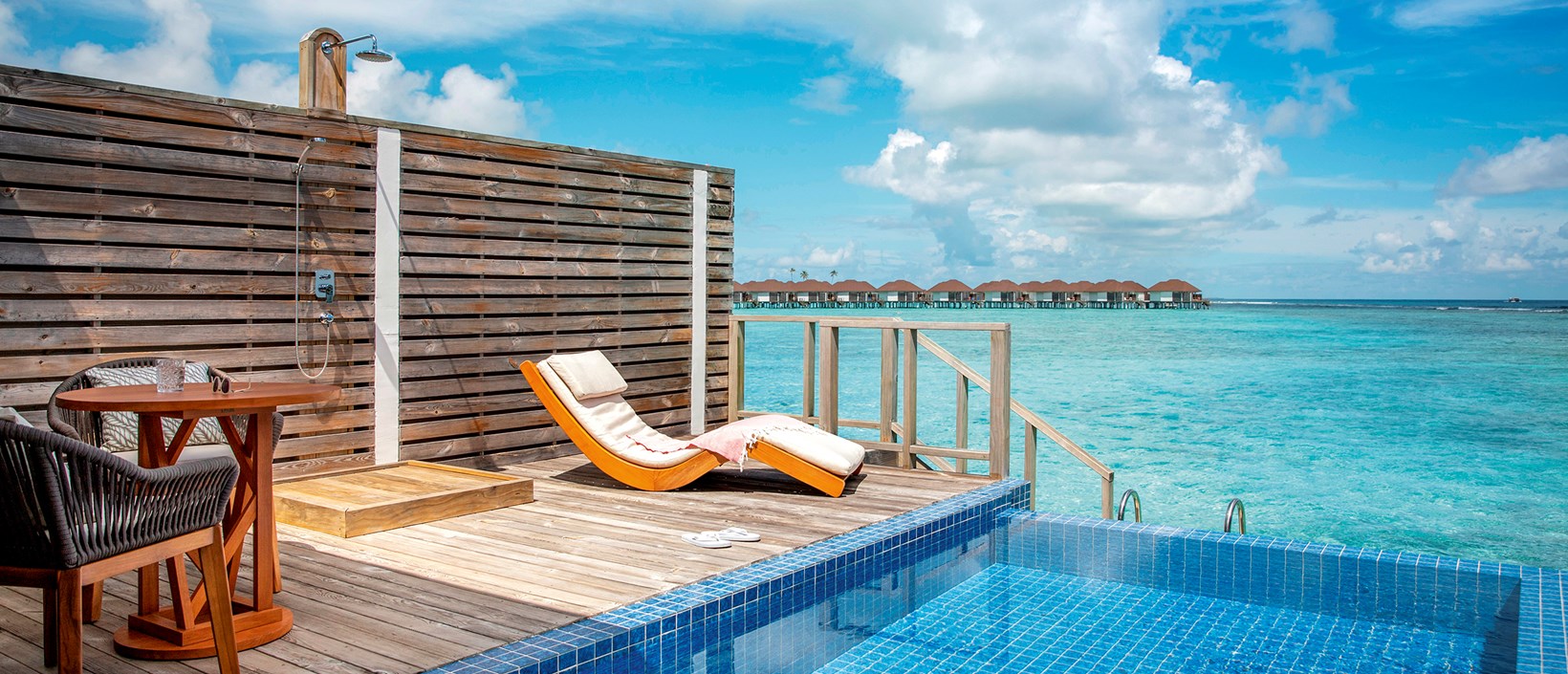 - This villa, set overwater with the best lagoon views, was designed for couples. Each villa is as intimate and private as can be. The interiors are contemporary with a hint of opulence Surrounding the private infinity pool is a wooden deck with chaises longues and a table perfect for your morning cup of coffee