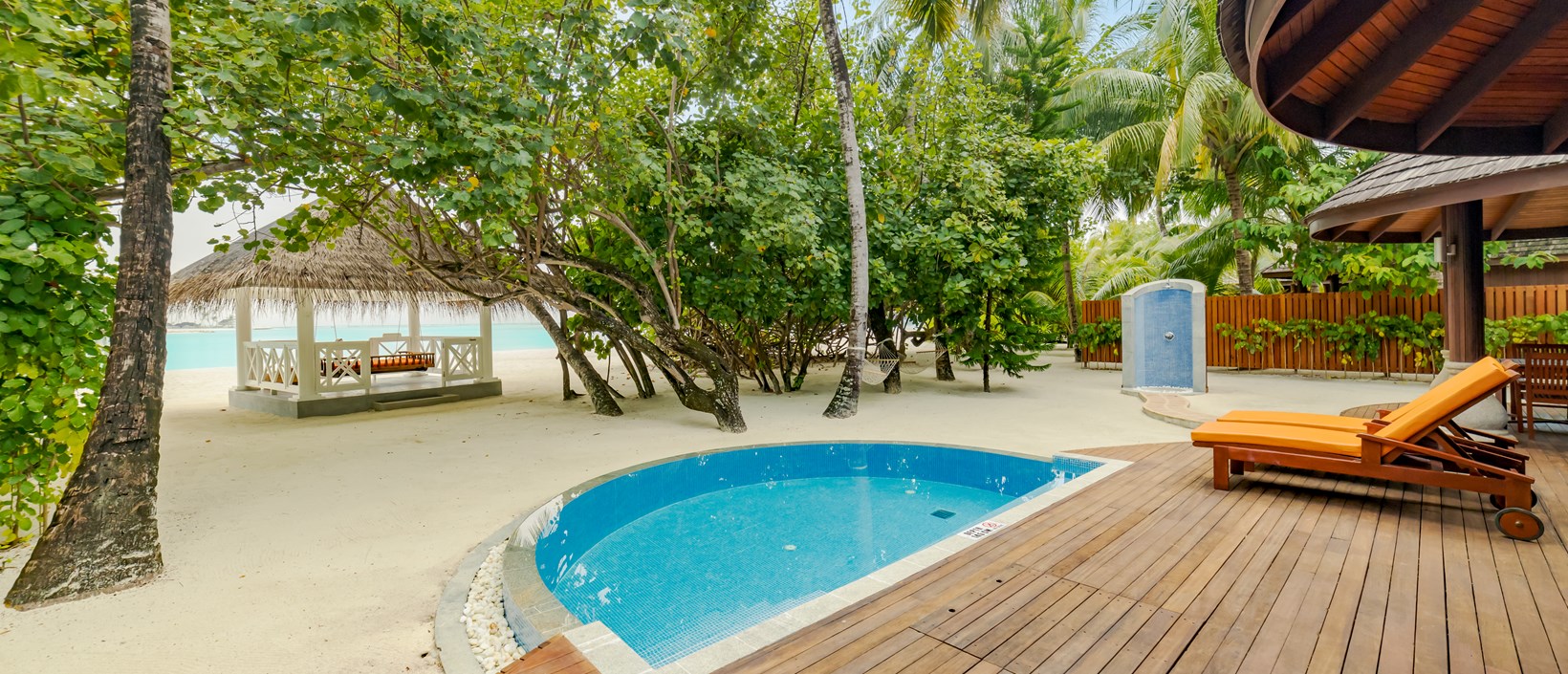 - With close to 300 sqm of beachside bliss, this is a favourite among families and friends travelling together. There are two master bedrooms with spacious indoor outdoor bathrooms. The veranda located beach side leads to a plunge pool Closer to the beach is an outdoor pavilion with a swinging daybed, perfect for an afternoon slumber.