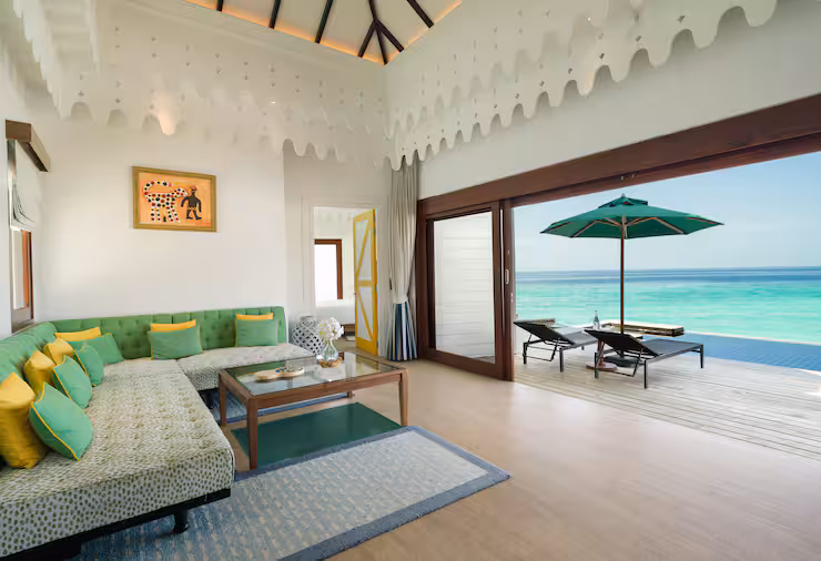 - 240 sq. m. / 2583 sq. ft. - Two bedrooms - Overwater - Private terrace with a pool - Direct lagoon access - Separate living room - Outdoor dining table - 55 inch LCD TV - WiFi - Handcrafted puzzles - Customized aroma bath amenity - Mini bar - Soundbar - Air conditioning - Sleeps up to 4 adults and 2 children (on a sofa bed)