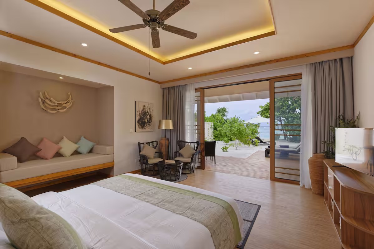 - Occupancy: 2 Adults + 2 Children (or) 3 Adults - Villa size: 81.4 m² - Bathroom amenities - Cable/Satellite Television - Ocean View - Sunbed - Safe - Seating Area with chair - Stocked Minibar - Coffee/Tea maker - Television - Terrace - Wireless Internet Connection